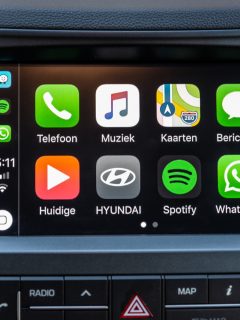 Apple CarPlay main screen in modern car dashboard. CarPlay is an Apple standard that enables a car radio or head unit to be a display and controller for an iPhone. - Apple CarPlay Not Working On My Honda - What To Do