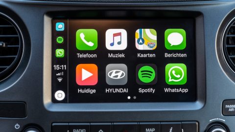 Apple CarPlay main screen in modern car dashboard. CarPlay is an Apple standard that enables a car radio or head unit to be a display and controller for an iPhone. - Apple CarPlay Not Working On My Honda - What To Do