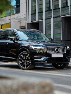 Plug-in hybrid SUV Volvo XC90 Recharge on a street. This model is the most luxury vehicle in Volvo offer.