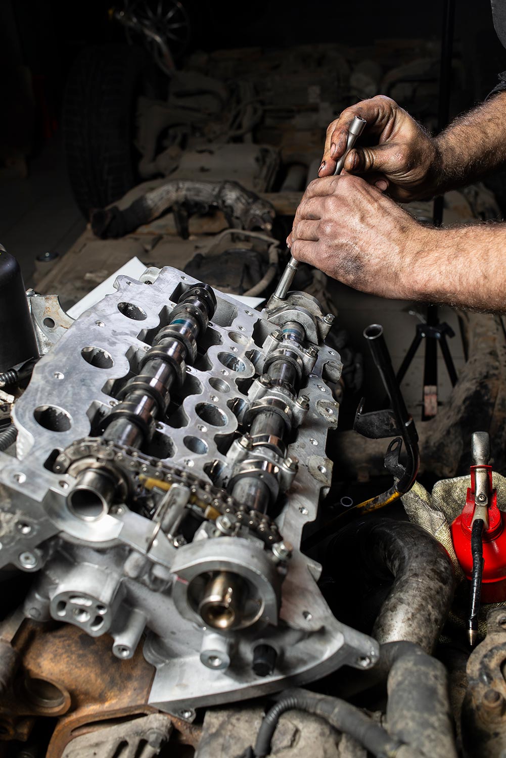 Repairing V6 engine in auto repair shop