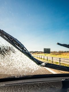 Spraying water on the windshield and turning on the wiper to clean it, How To Remove Wiper Marks From Windshield