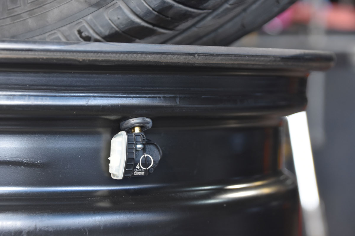 Tire pressure attached in a car tire rim