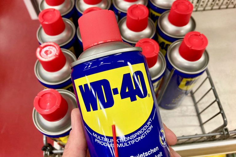 WD-40 lubricant products displayed on a store, Can You Use Wd40 To Remove Spray Paint From A Car?