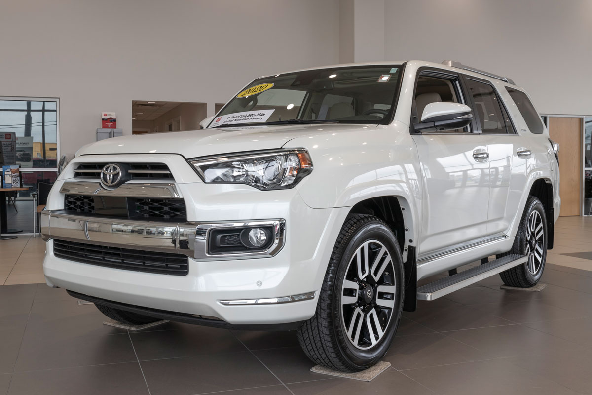 White Toyota 4Runner at a dealership