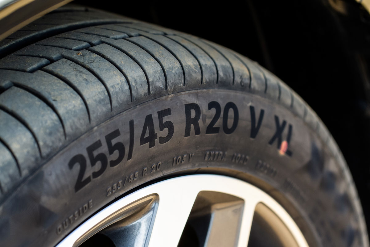 tire with tire width, height and wheel diameter designation and other labels