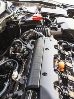 A car engine under repair at the auto shop, Car Feels Worse After Oil Change - What Could Be Wrong?