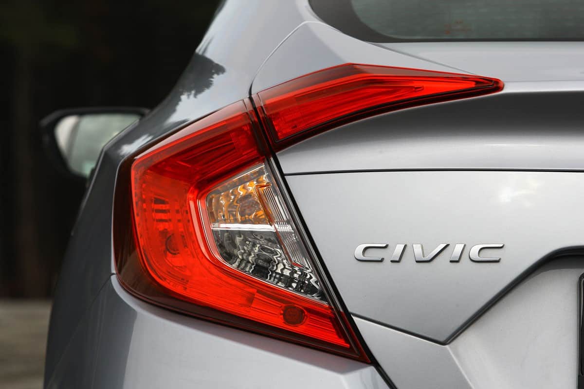 A grey Honda Civic emblem