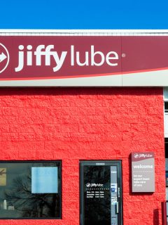 A person at a Jiffy Lube location in Denver, Colorado. Jiffy Lube, a subsidiary of Shell Oil, is a chain of automotive service centers, Does Jiffy Lube Replace Tires?