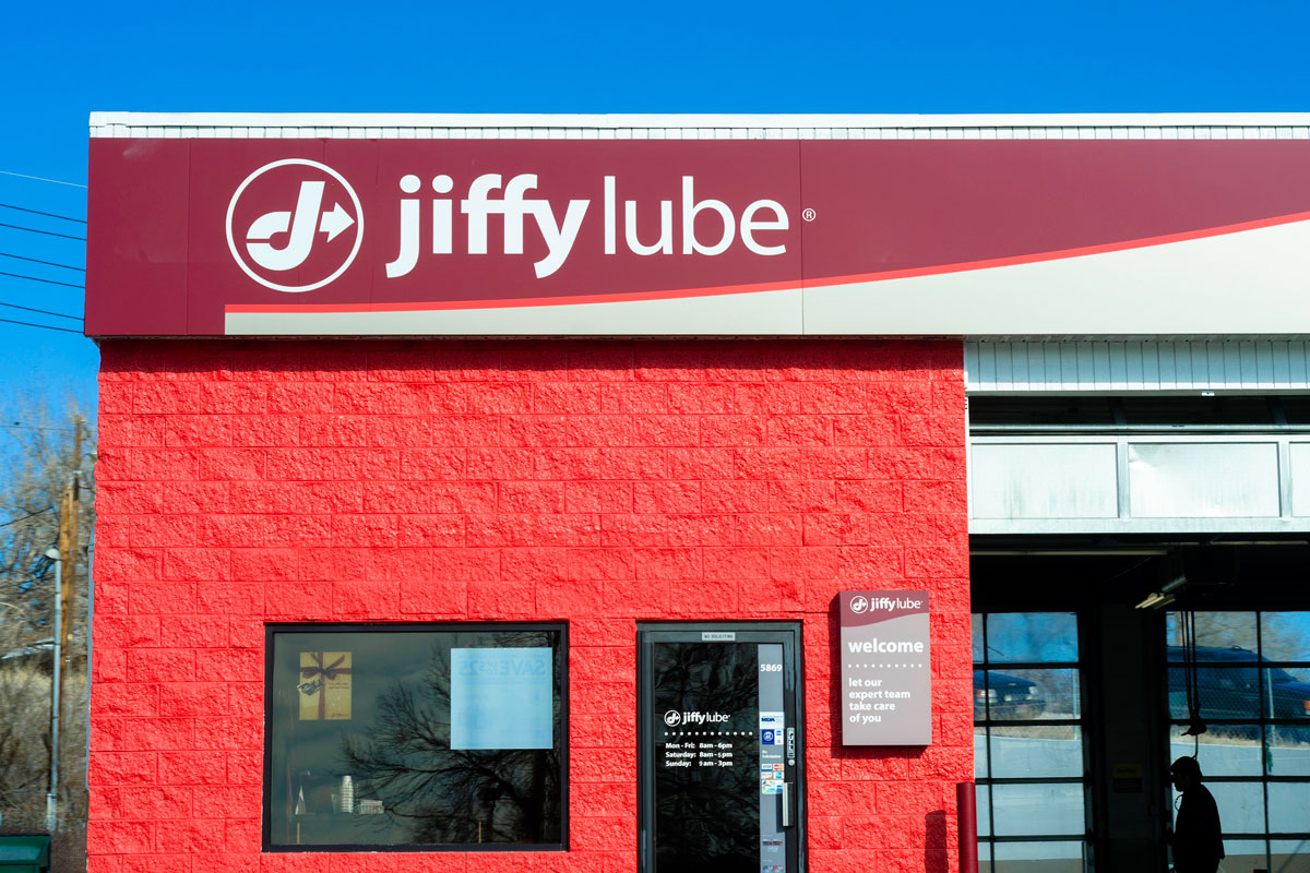 A person at a Jiffy Lube location in Denver, Colorado. Jiffy Lube, a subsidiary of Shell Oil, is a chain of automotive service centers