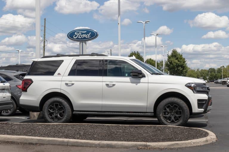 A white Ford Expedition on the parking lot, Ford Expedition Interior Lights Flashing—Why And What To Do?
