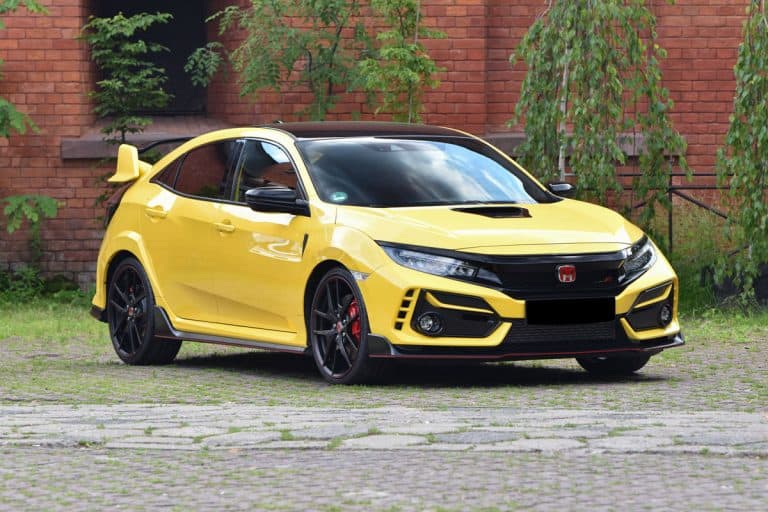 A yellow Honda Civic Type R in a parking lot, Can A Honda Civic Pull A Trailer?