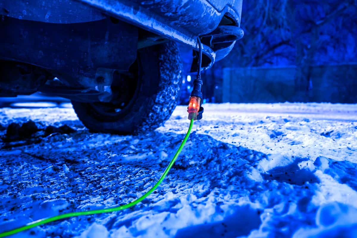 An engine block heater attached to a car
