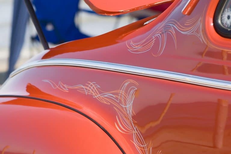 Antique car with beautiful orange sunburst paint, How To Remove Painted Pinstripe From Car