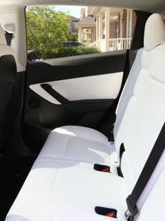 Brand new 2022 Tesla Model Y Dual Motor in red color with white and black interior. Modern electric vehicle, Does Tesla Model 3 Have Ac Seats?