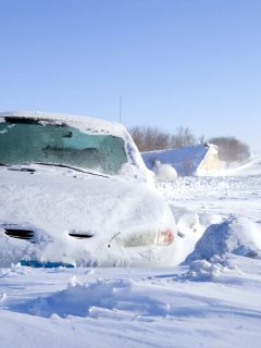 Car covered in heavy snow, Can Getting Stuck In Snow Damage A Car?