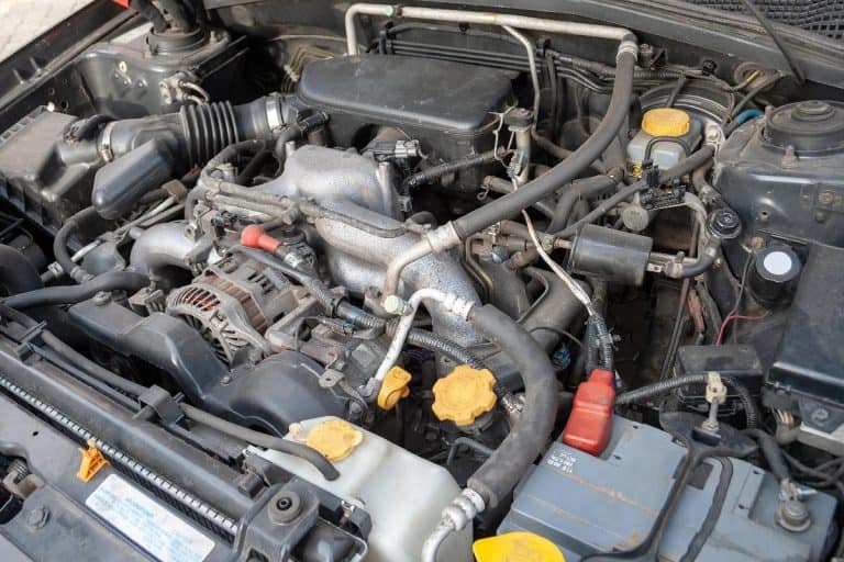 A car engine under the open hood, Car Won't Start After Replacing Alternator - What's Wrong?