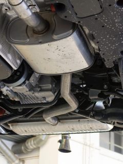 Car on a lift in a car service, Car Makes Noise When Releasing Gas Pedal - What Could Be Wrong?