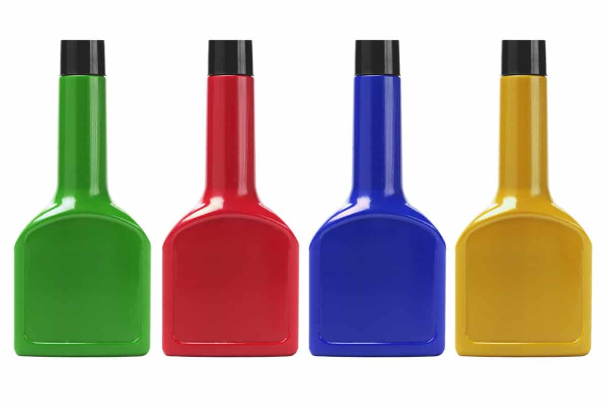 Colorful Plastic Containers On White Background