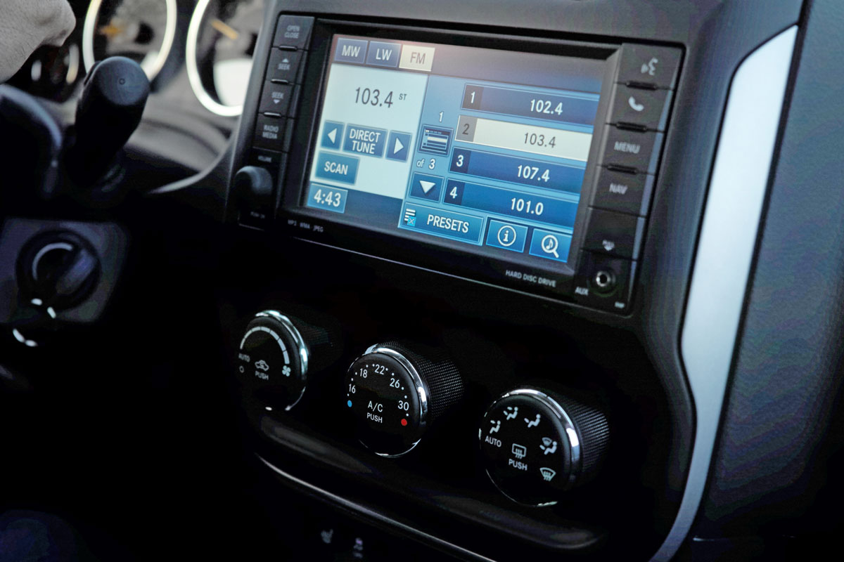 Different radio stations on the car entertainment panel