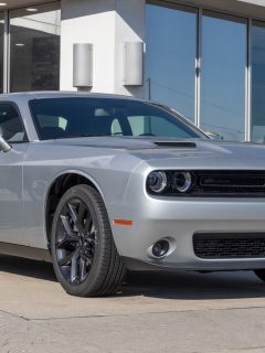 Dodge Challenger display. The Dodge Challenger is a product of Stellantis and comes in SXT, GT, RT, RT Scat Pack and SRT Hellcat models. - Dodge Challenger SXT Vs. GT Which To Buy