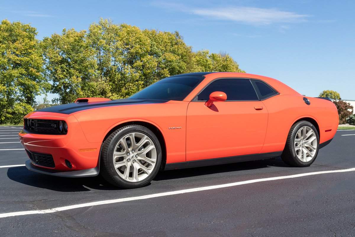 Dodge Challenger display. The Dodge Challenger is a product of Stellantis and comes in SXT, GT, R/T, R/T Scat Pack and SRT Hellcat models.