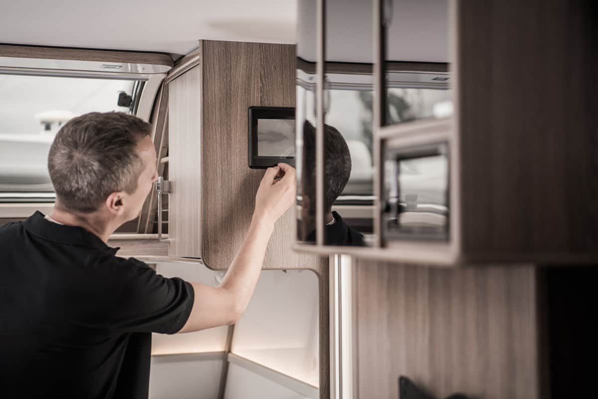 Technician checking the RV computer date to check for any damages
