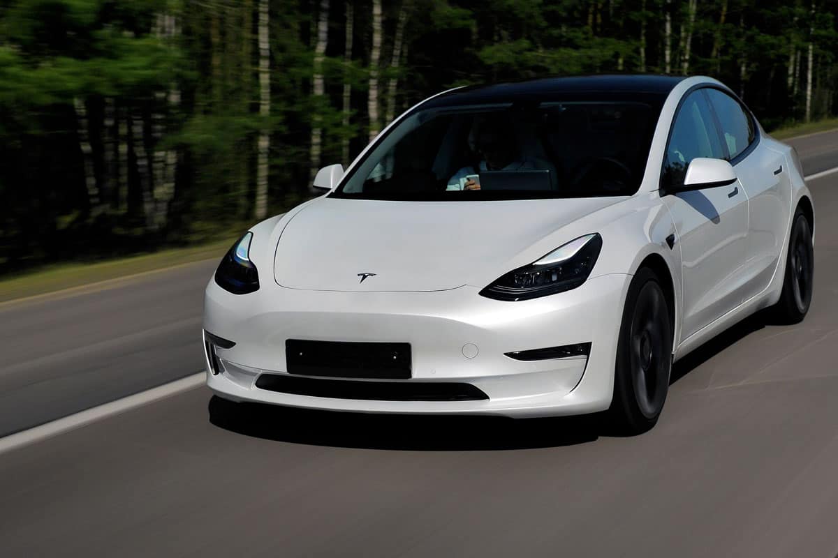 Tesla Model 3 Performance 2021 MY drives on a highway