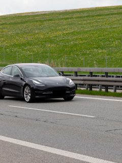 Tesla Model 3 cruising down the highway, Does Tesla Model 3 Have 360 Camera?