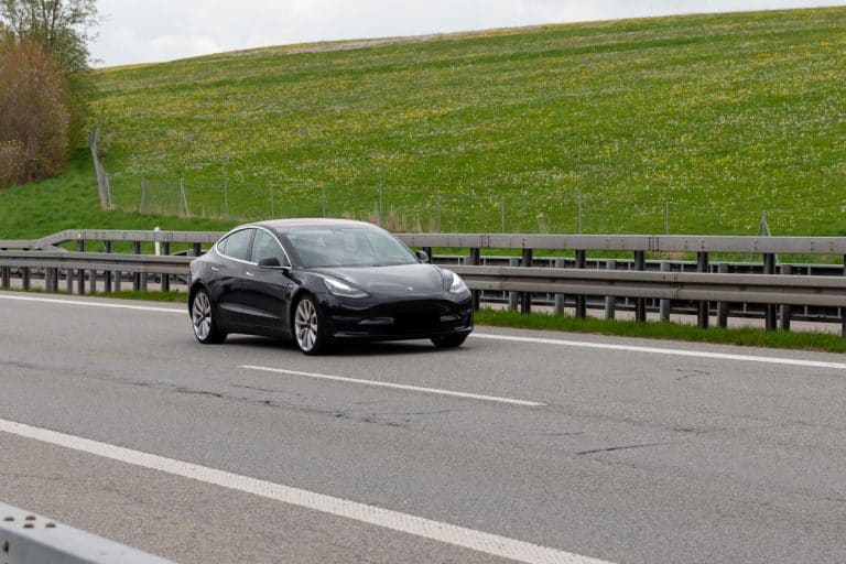 Tesla Model 3 cruising down the highway, Does Tesla Model 3 Have 360 Camera?