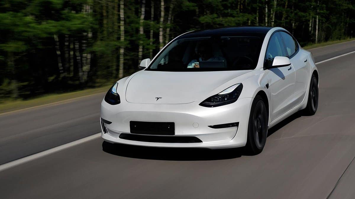 Tesla Model 3 performance 2021 drives on a highway