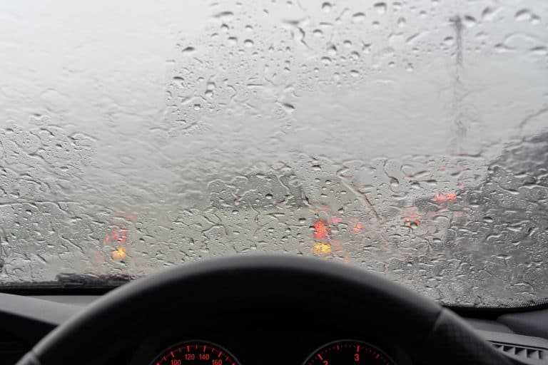 Traffic jam while driving in heavy rain - Car Windows Fogging Up Inside When It Rains - What To Do