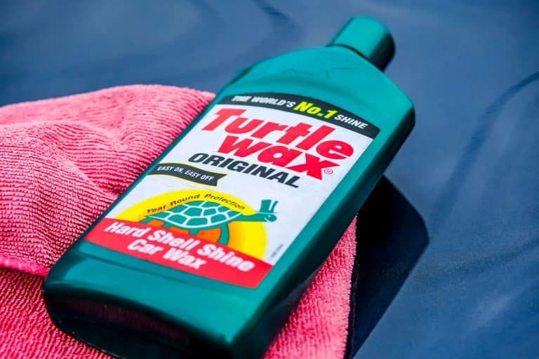 Turtle Wax automotive polish on a red cloth on a car bonnet, Does Turtle Wax Remove Scratches?
