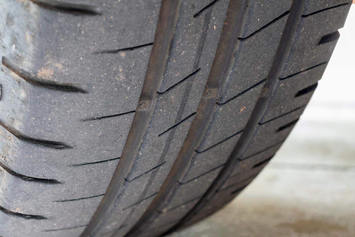 Used car tire with tread wear indicator (TWI)