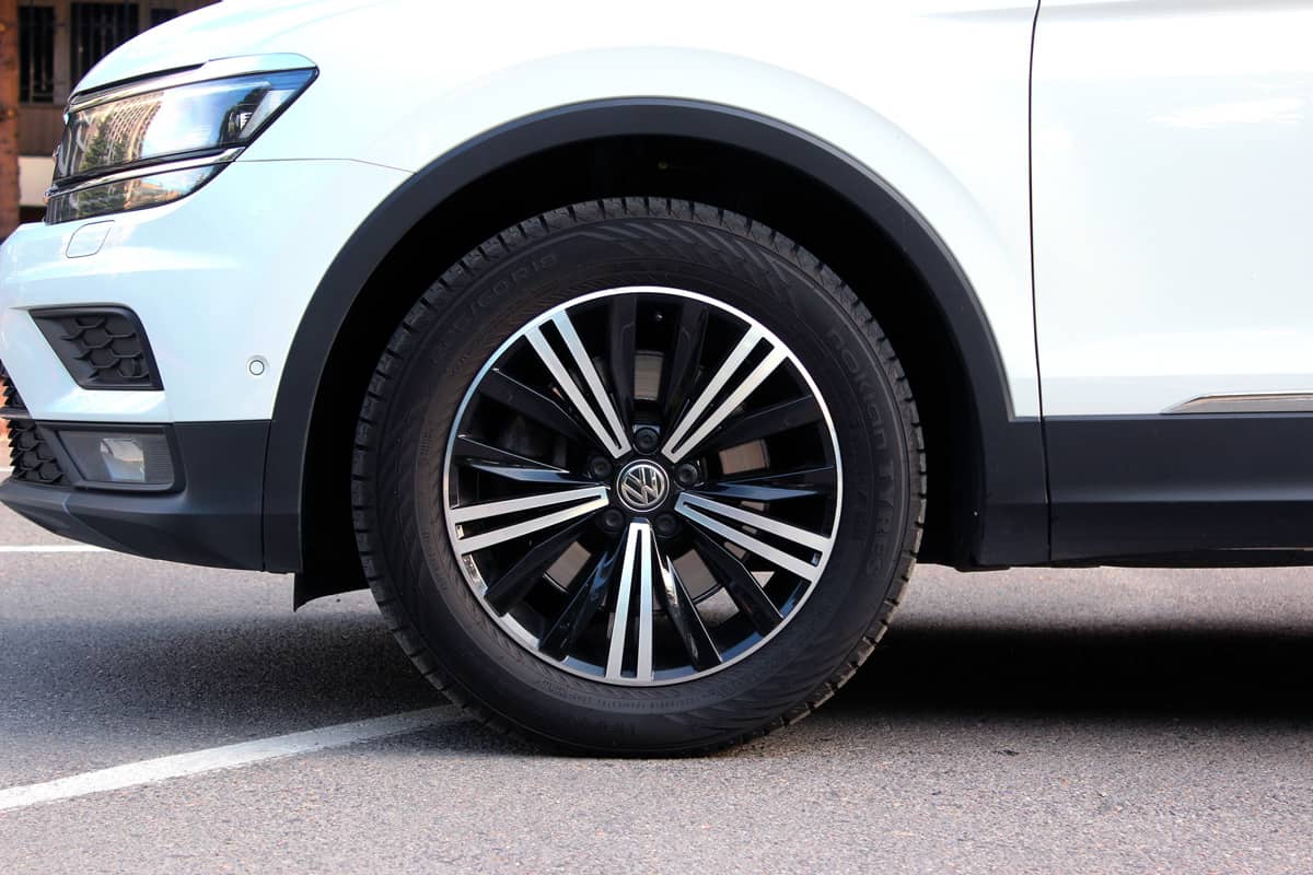 Volkswagen Tiguan front wheel. Front wheel of a modern SUV. Nokian tires on the front of the car.