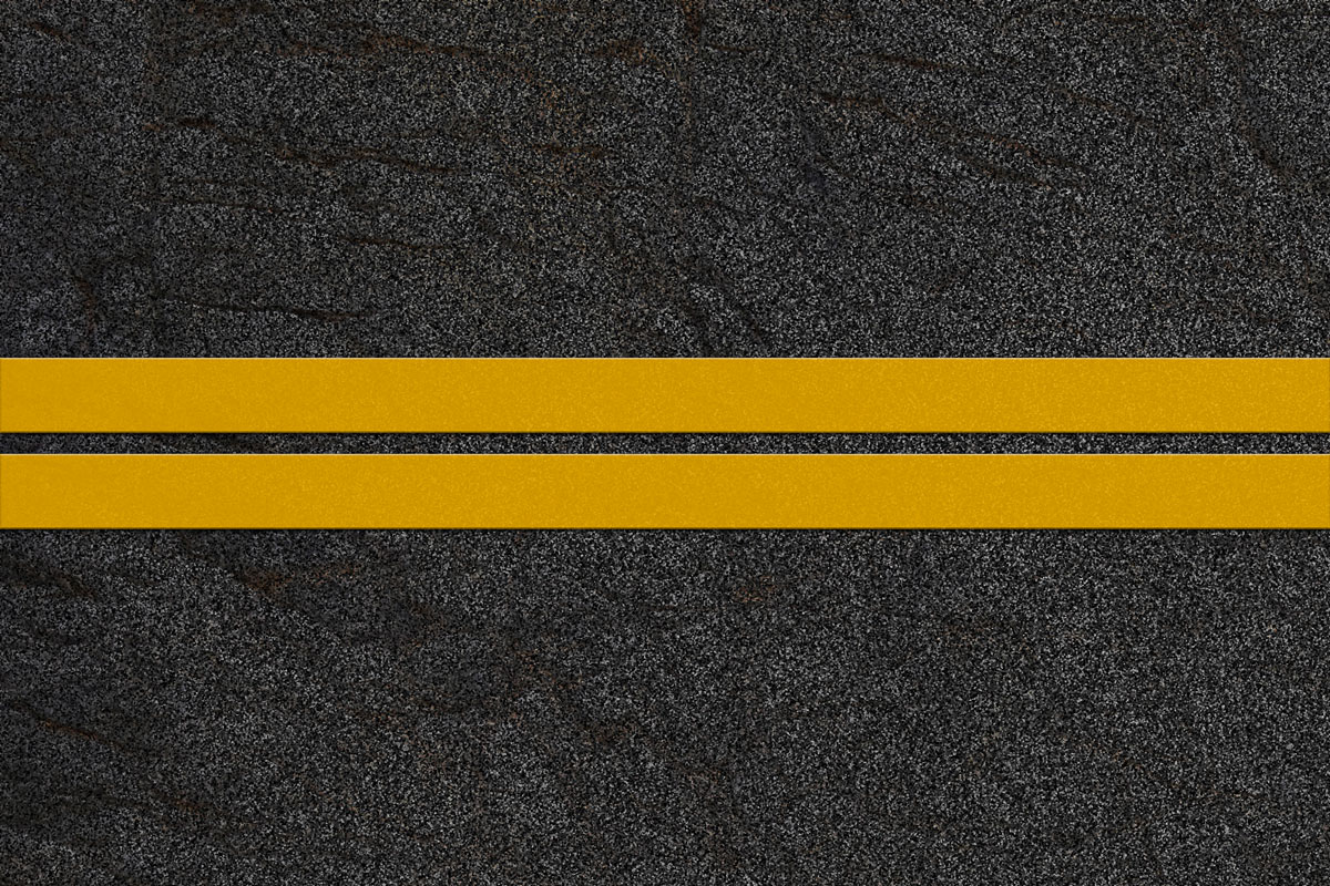 asphalt road with two dividing lanes