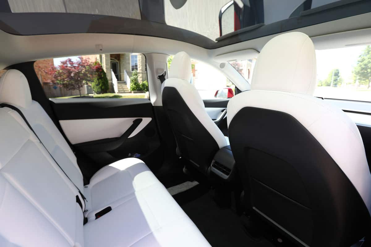 driving an electric vehicle, Modern and sleek car interior, Simple and beautiful design Luxury vehicle