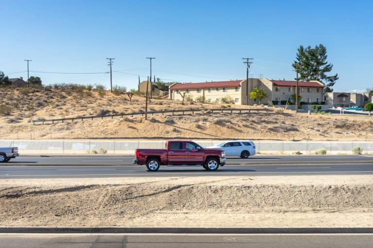 A Chevy Silverado pickup truck traveling on Highway 18 in Apple Valley, California., Chevy Silverado Clunking Noise When Accelerating - What Could Be Wrong?