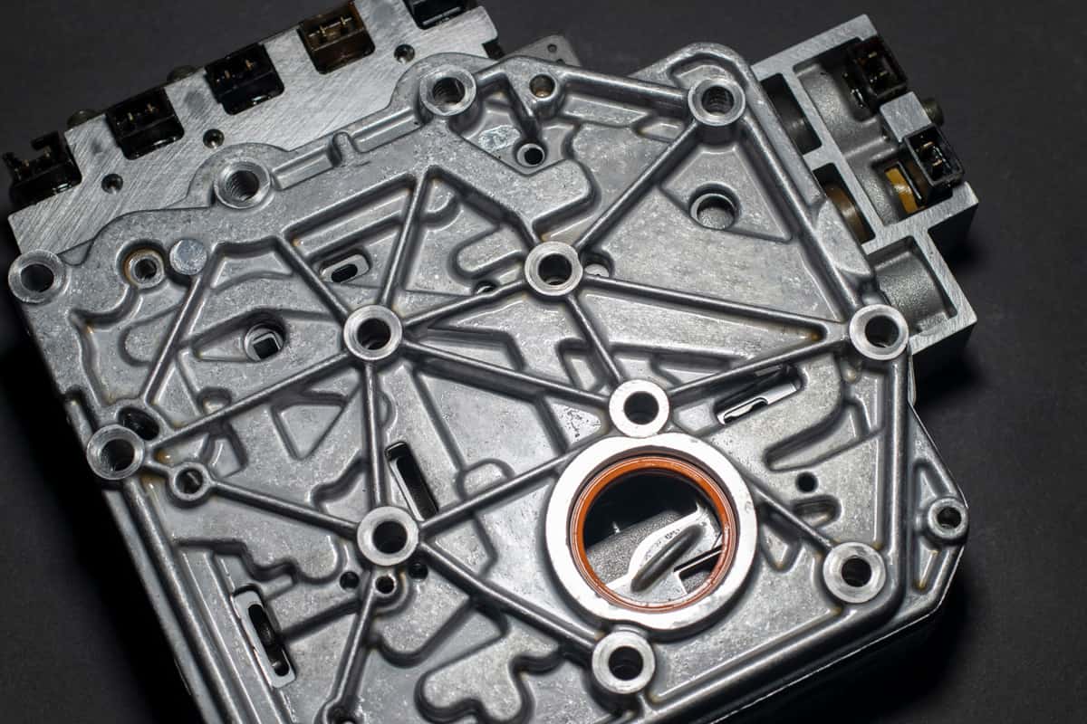 A disassembled car valve body