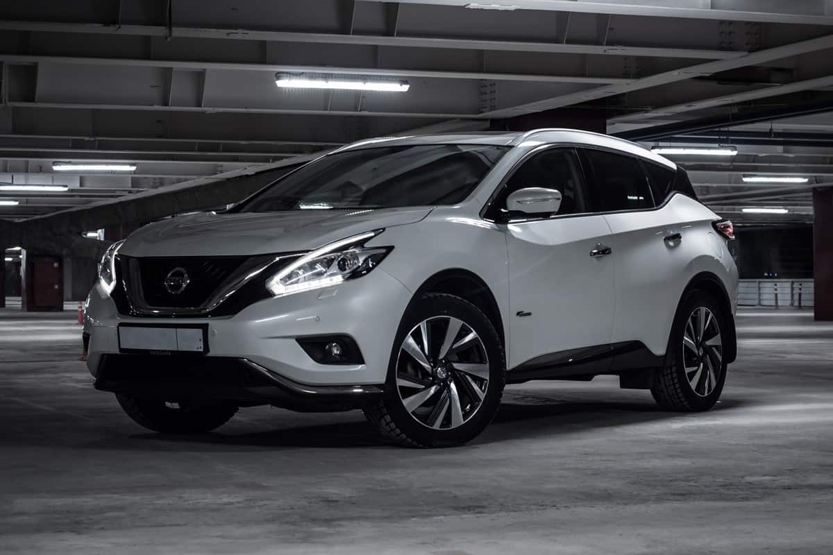 A white Nissan Murano at the parking lot