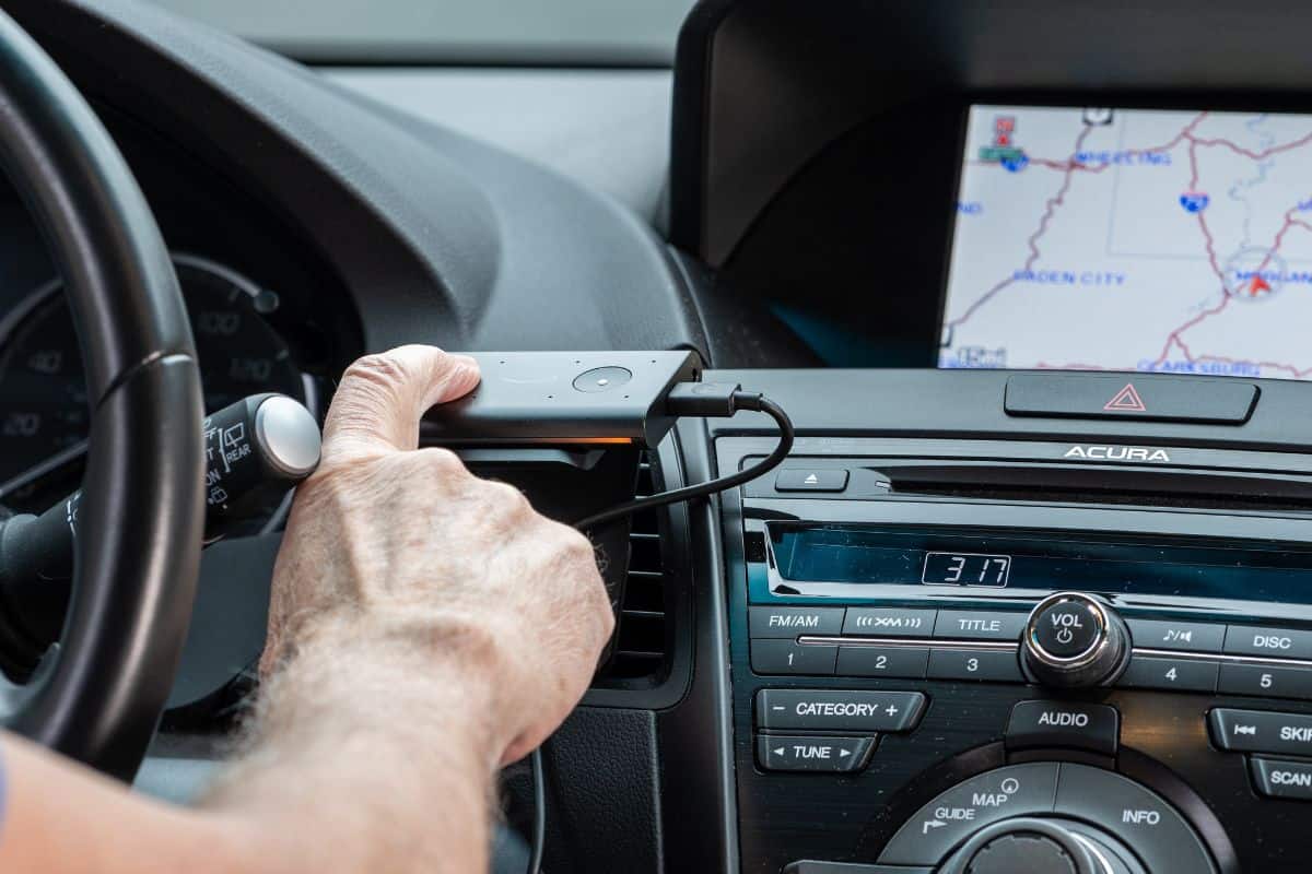 Amazon Echo Auto smart voice operated device installed in a car to provide Alexa services