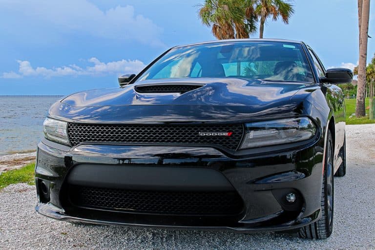 An SRT Dodge Charger GT parked along the coast, How To Watch Netflix In Dodge Charger?