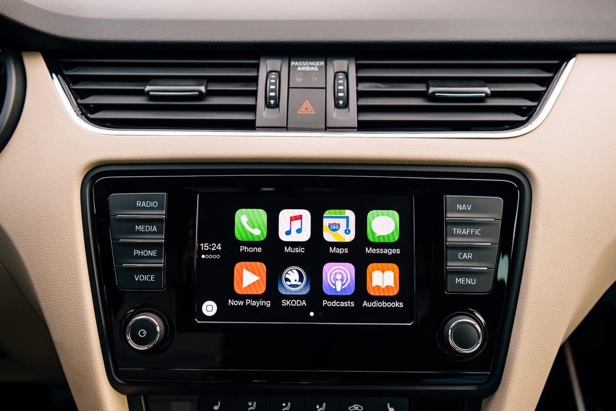 Apple CarPlay main screen in modern car dashboard. CarPlay is an Apple standard that enables a car radio to be a controller for an iPhone.