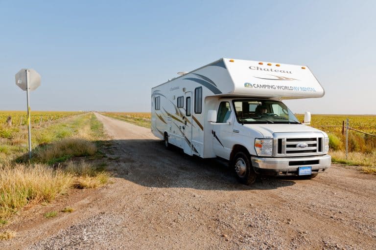Camping World RV parked on a rural dirt road near Route 66 in Conway, Texas, 5 RV Laws In Texas You Should Know [And Other Useful Information]