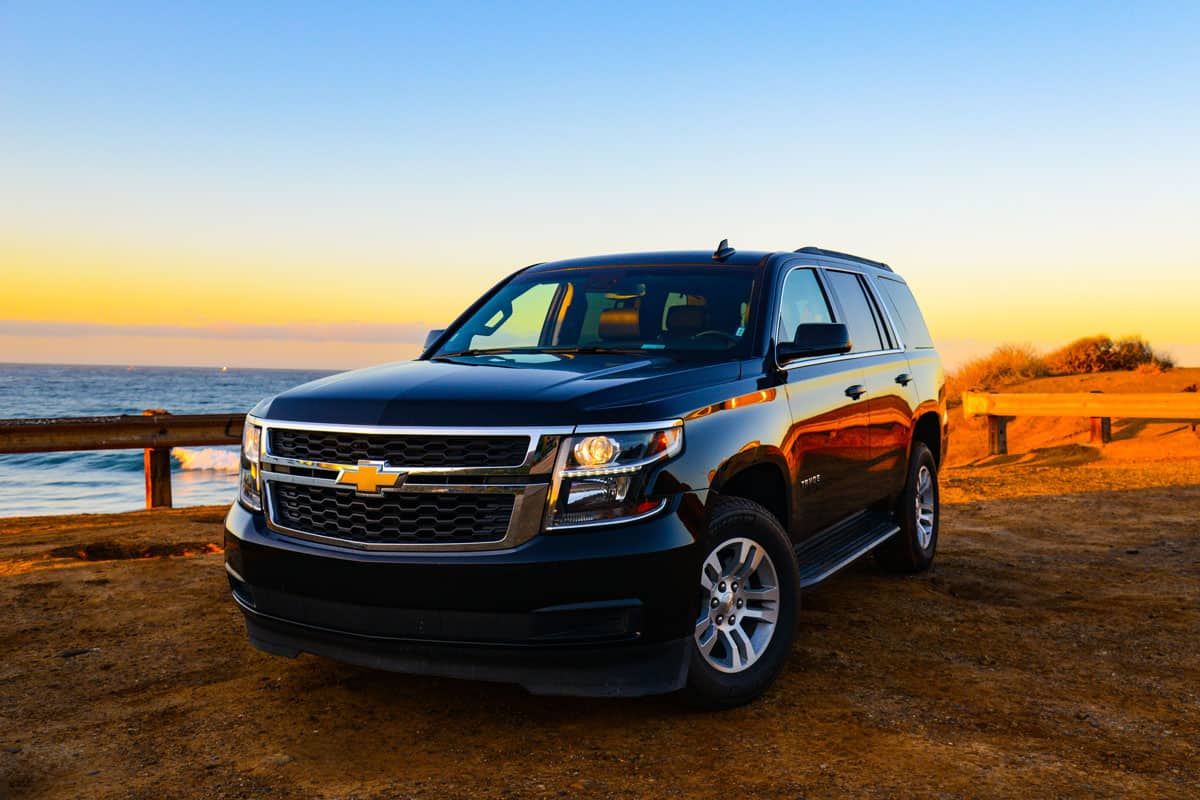 Emotional Chevrolet Thaoe at the sunrise. American Tipica SUV on the beach