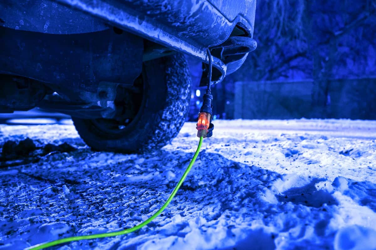 Extension cord plugged into truck on freezing cold night