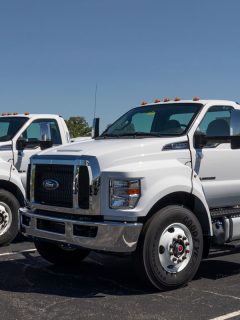 Ford F750 Dually Trucks at a dealership, How Many Cars Can A Dually Haul?