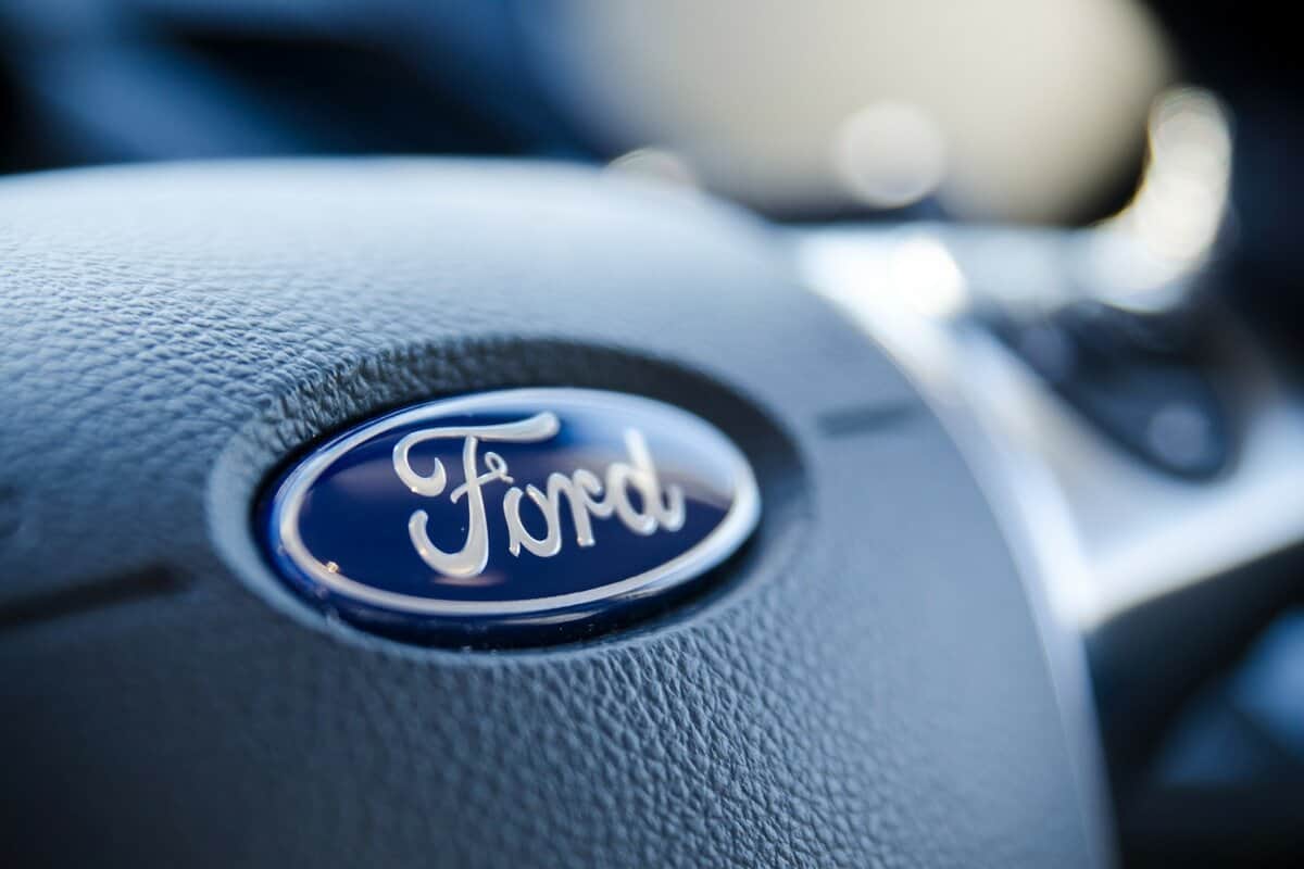 Ford sign on steering wheel close up. Ford is the most popular car on the aftermarket in Poland