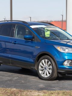 Used Ford Escape display at a dealership. With supply issues, Ford is relying on pre-owned car sales to meet demand - Ford Escape Engine Fault - Service Now Light On - What To Do
