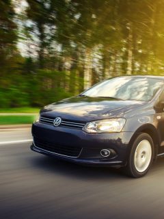 Volkswagen Polo Sedan car drive on the road at sunset, Car Sounds Like Air Escaping? Here's What Hissing Sounds Could Mean