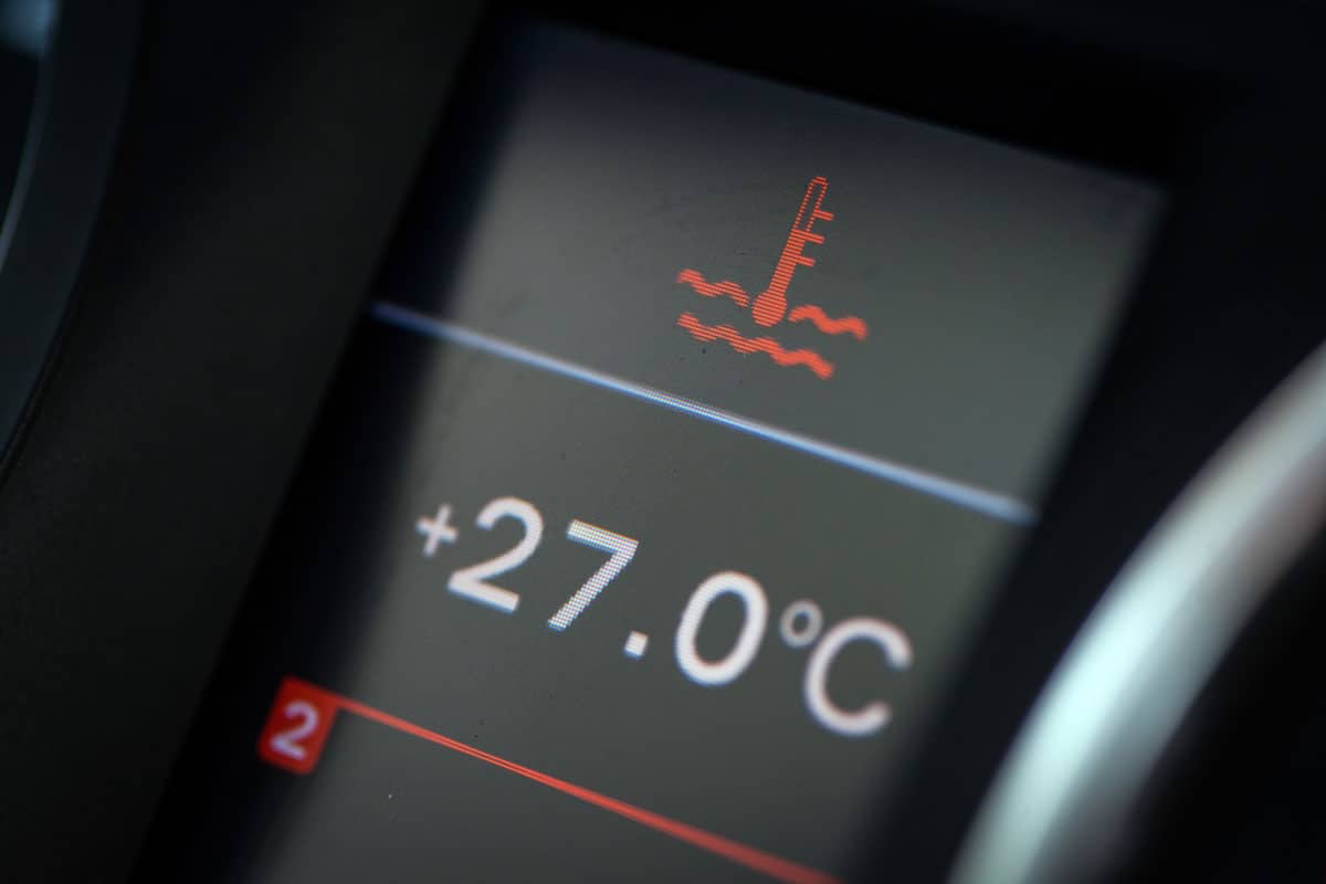 photo of a car interior speedometer gauge showing car temperature
